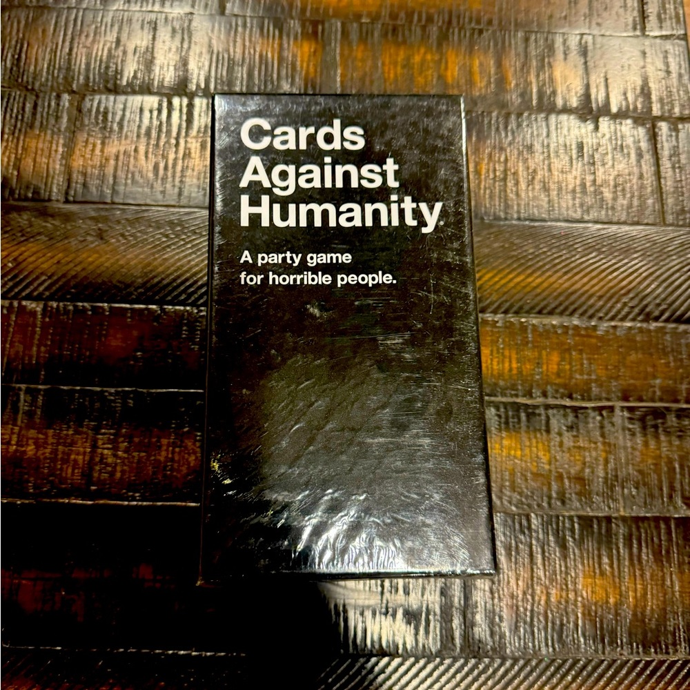Cards against humanity- Unopened in wrapper.